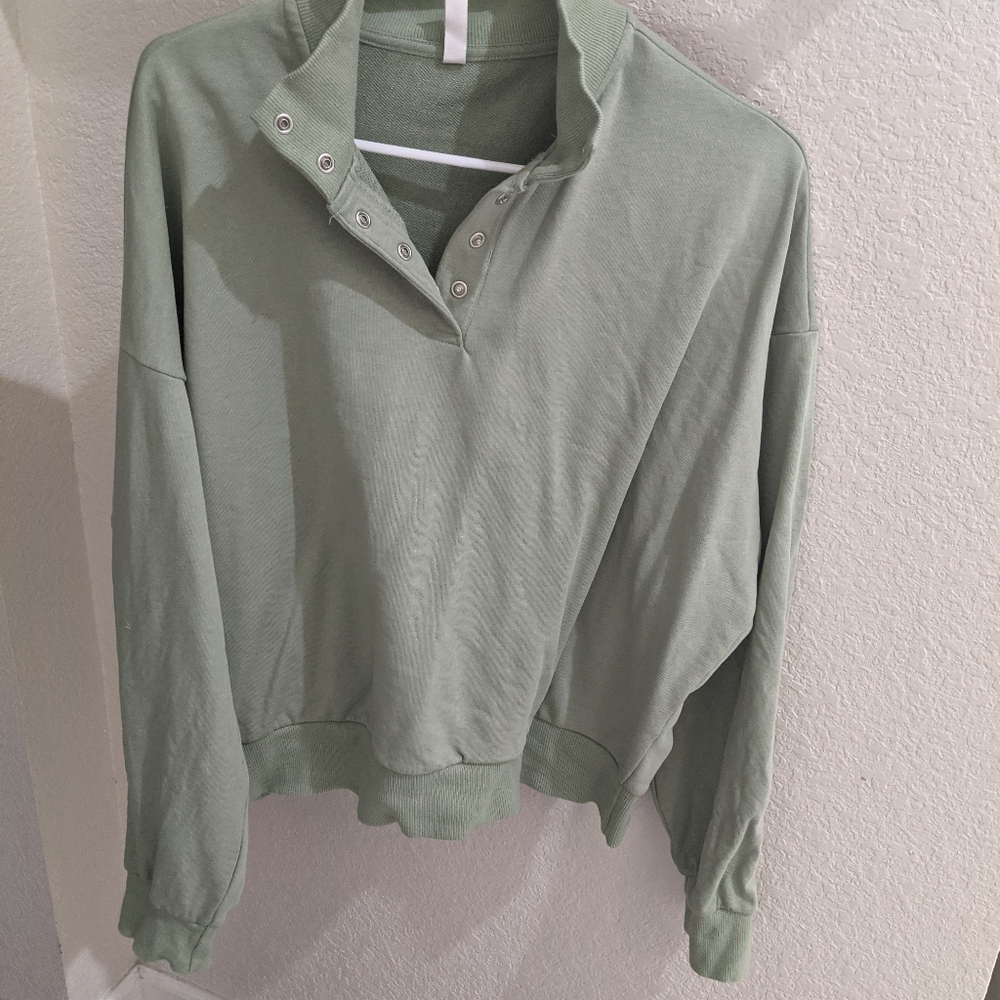 Sea green crop henley sweatshirt.